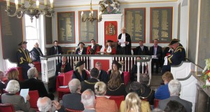 council chamber, with the new Mayor of Rye, surrounded by her councillors,